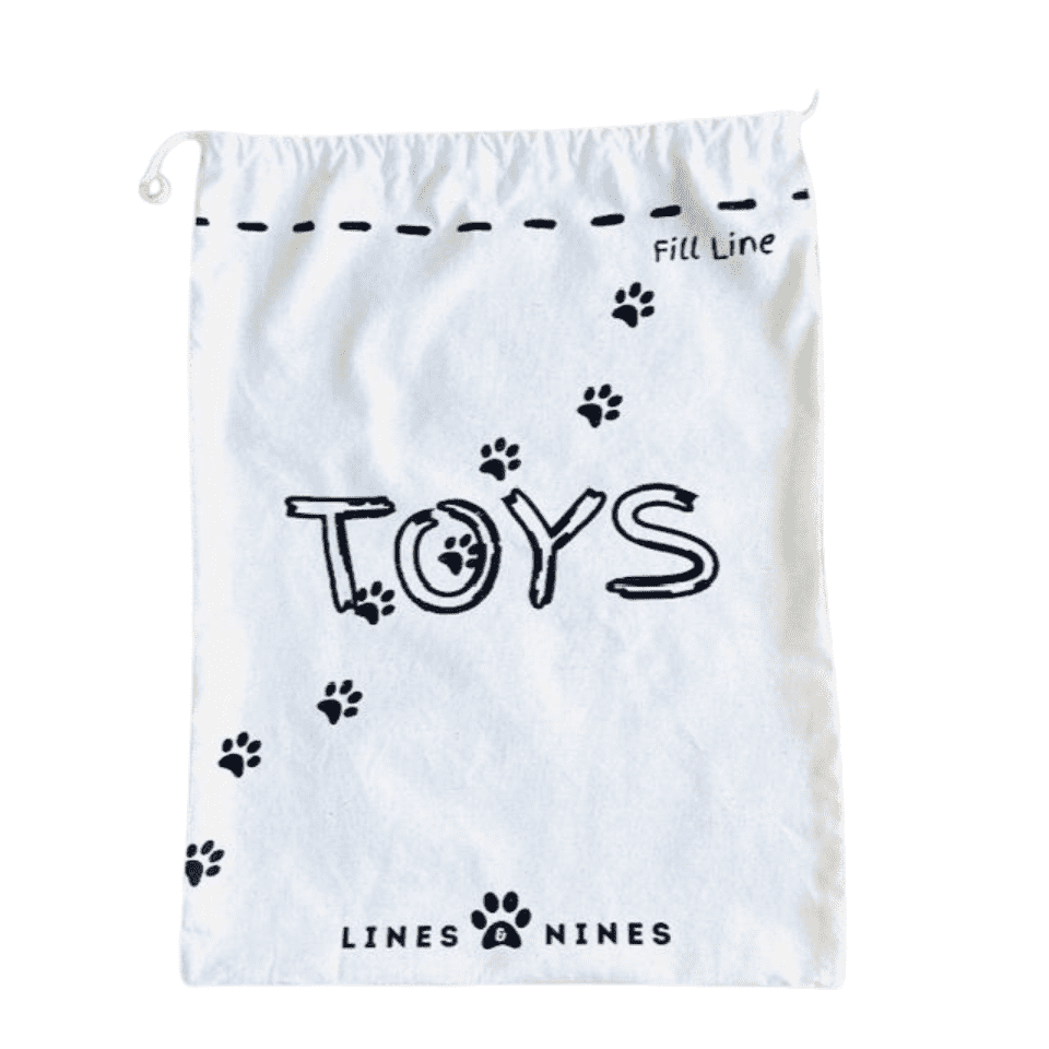 Paw print toys bag for dogs and cats in natural linen.